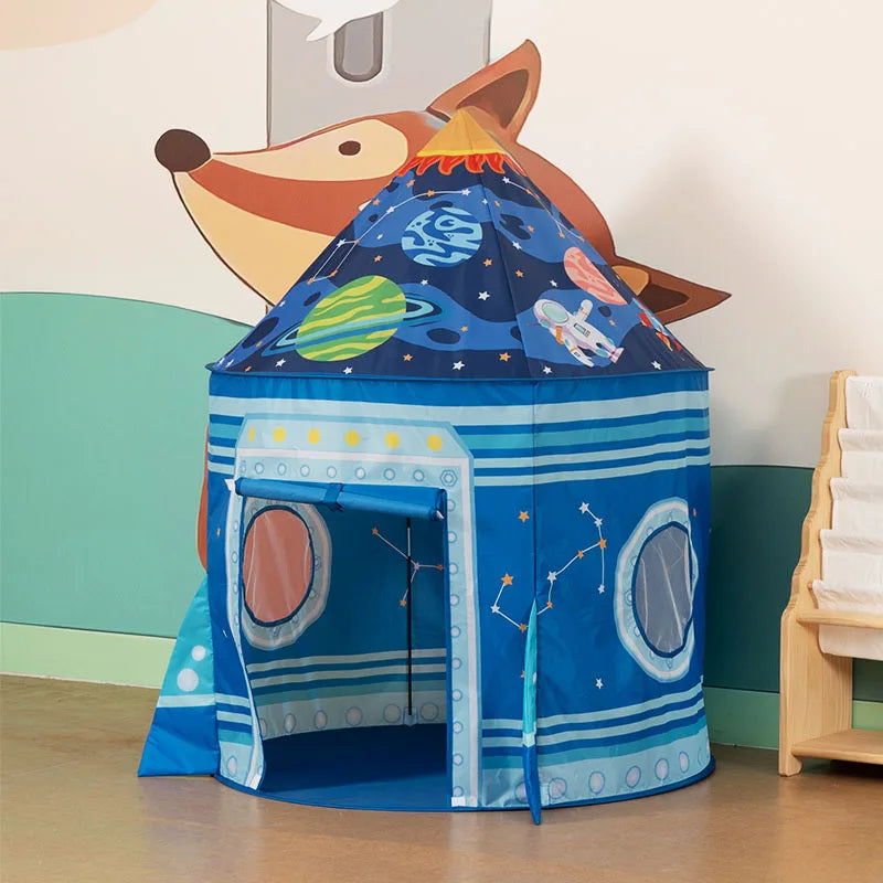 A blue rocket ship pop-up play tent with a fox head decoration on the background.