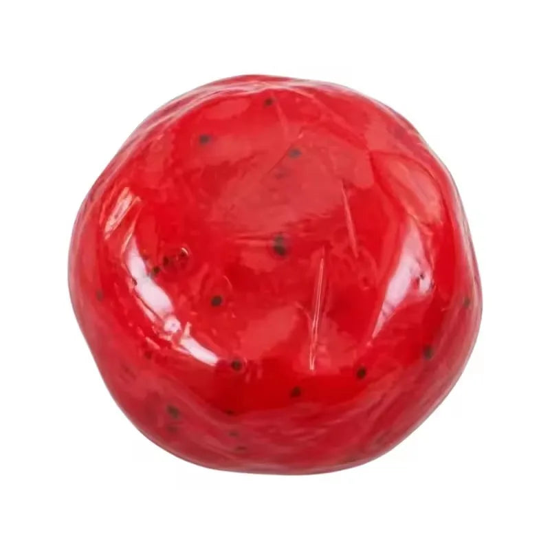 A bright red, spherical slime or squishy toy with small black dots.