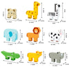 A set of wooden animal stacking balance game featuring various shapes and sizes like a giraffe, zebra, elephant, and others.