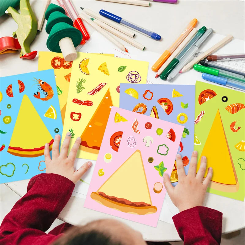 A child's hands are holding a colorful DIY pizza sticker craft kit featuring various fruit and vegetable shapes on yellow and