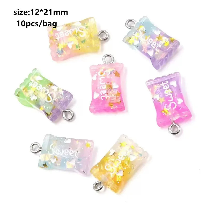 A collection of 10 clear and colored DIY sunflower charms for jewelry making in various sizes and shades