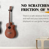 Two acoustic guitars are safely displayed on wall hangers, emphasizing protection from friction.