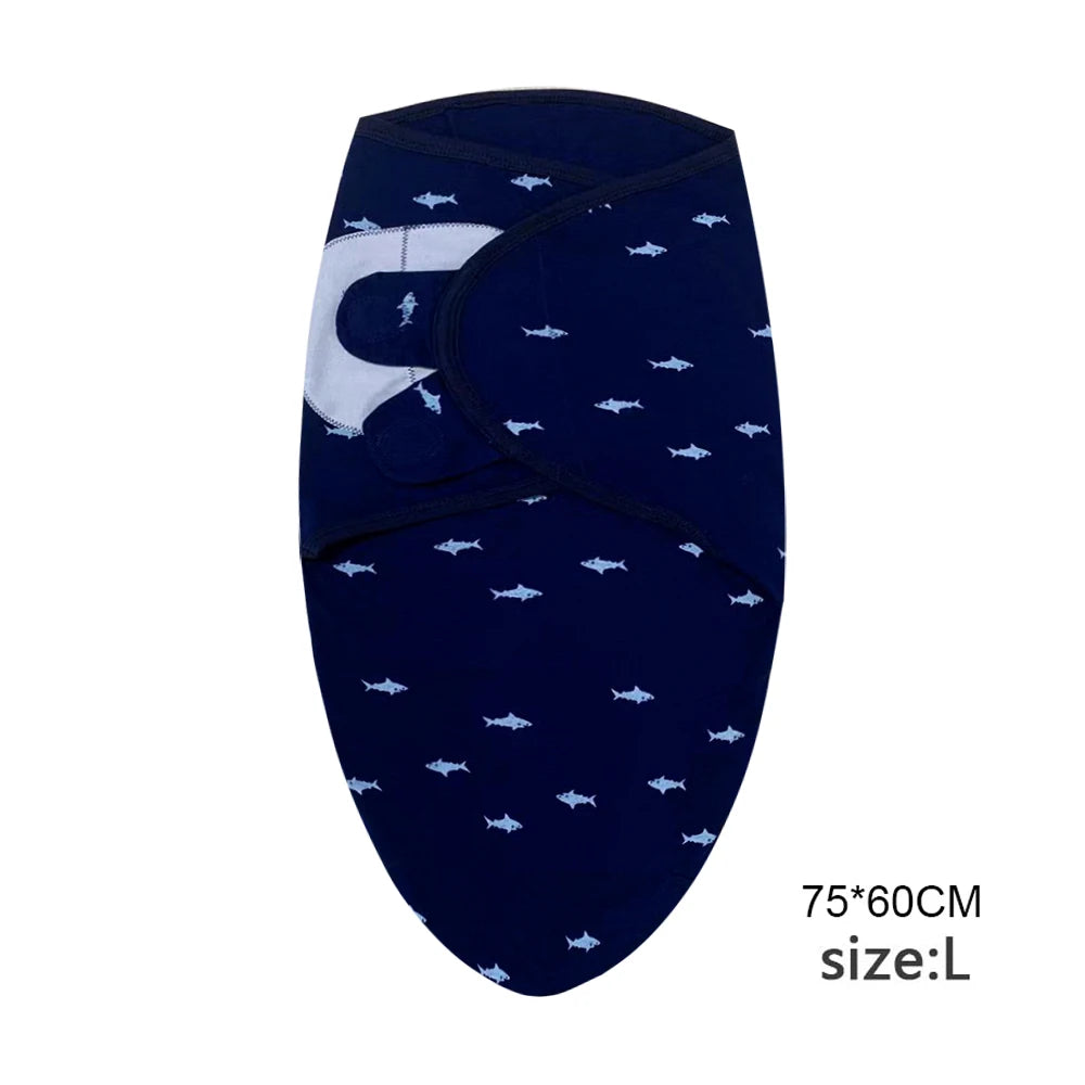 Navy blue cotton newborn swaddle blanket and hat set with white accents