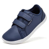 Navy blue kids barefoot sneakers with double hook-and-loop straps shown from the side.