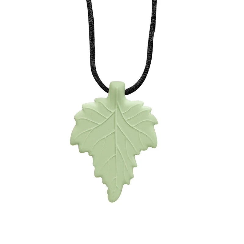 A silicone leaf-shaped necklace with a black cord for teething and sensory calming.