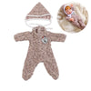 A knitted brown winter romper outfit for a reborn doll, shown with a matching hood and a close-up of a baby's face.
