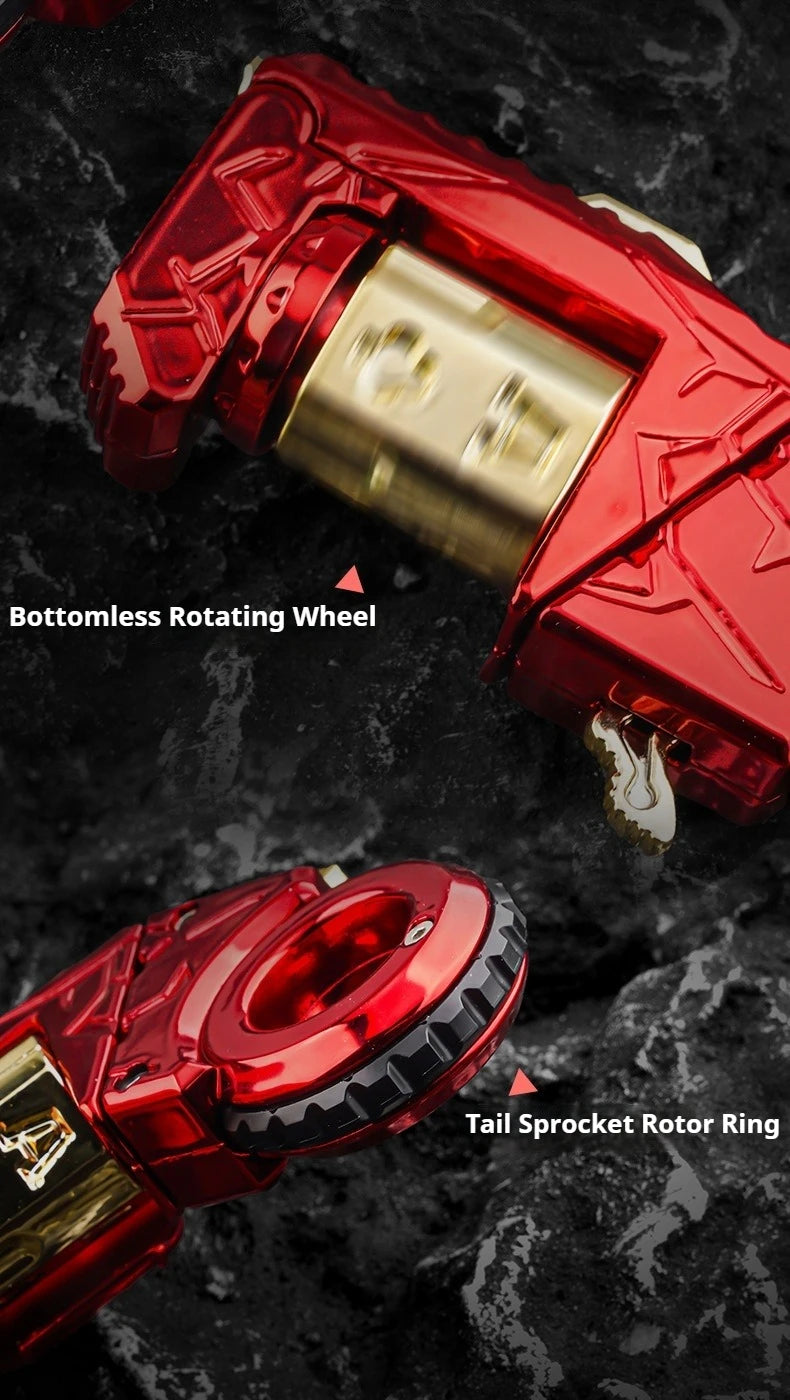 Close-up view of a red metal gun-shaped fidget slider showing the bottomless rotating wheel and tail sprocket rotor ring comp