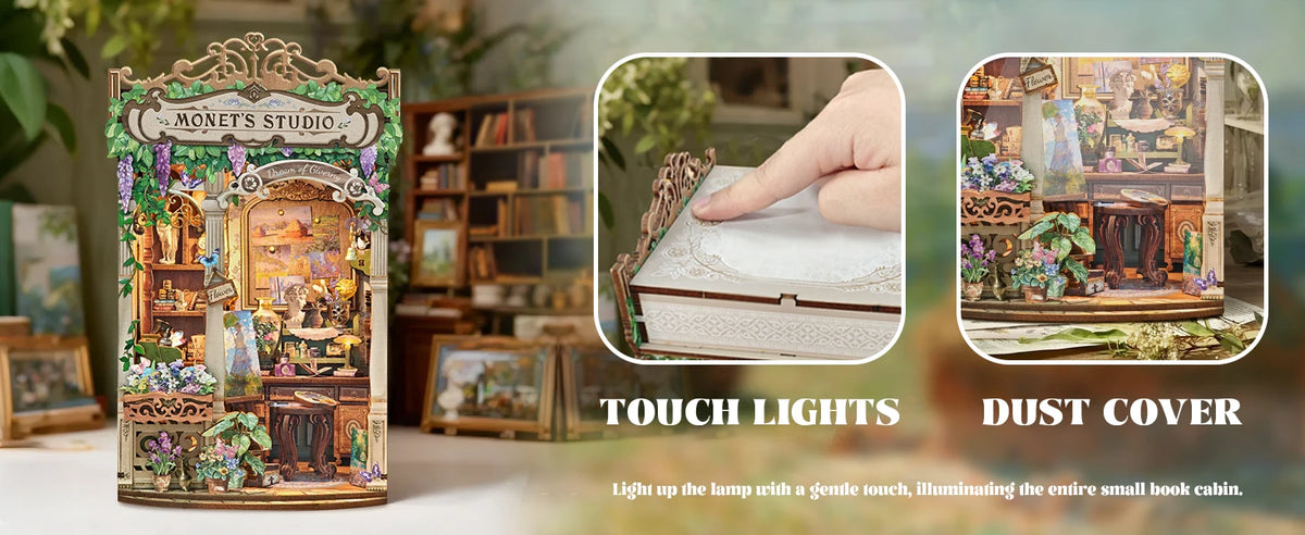 A close-up of a DIY wooden book nook kit featuring Monet's Studio miniature, showing a lighted display inside a dust cover.