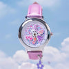 A pink My Little Pony Magic Sweetheart blind box watch with a purple strap is shown against a bright blue sky and white cloud