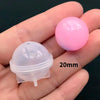 A hand holds a pink silicone sphere mold for resin crafting, measuring 20mm.