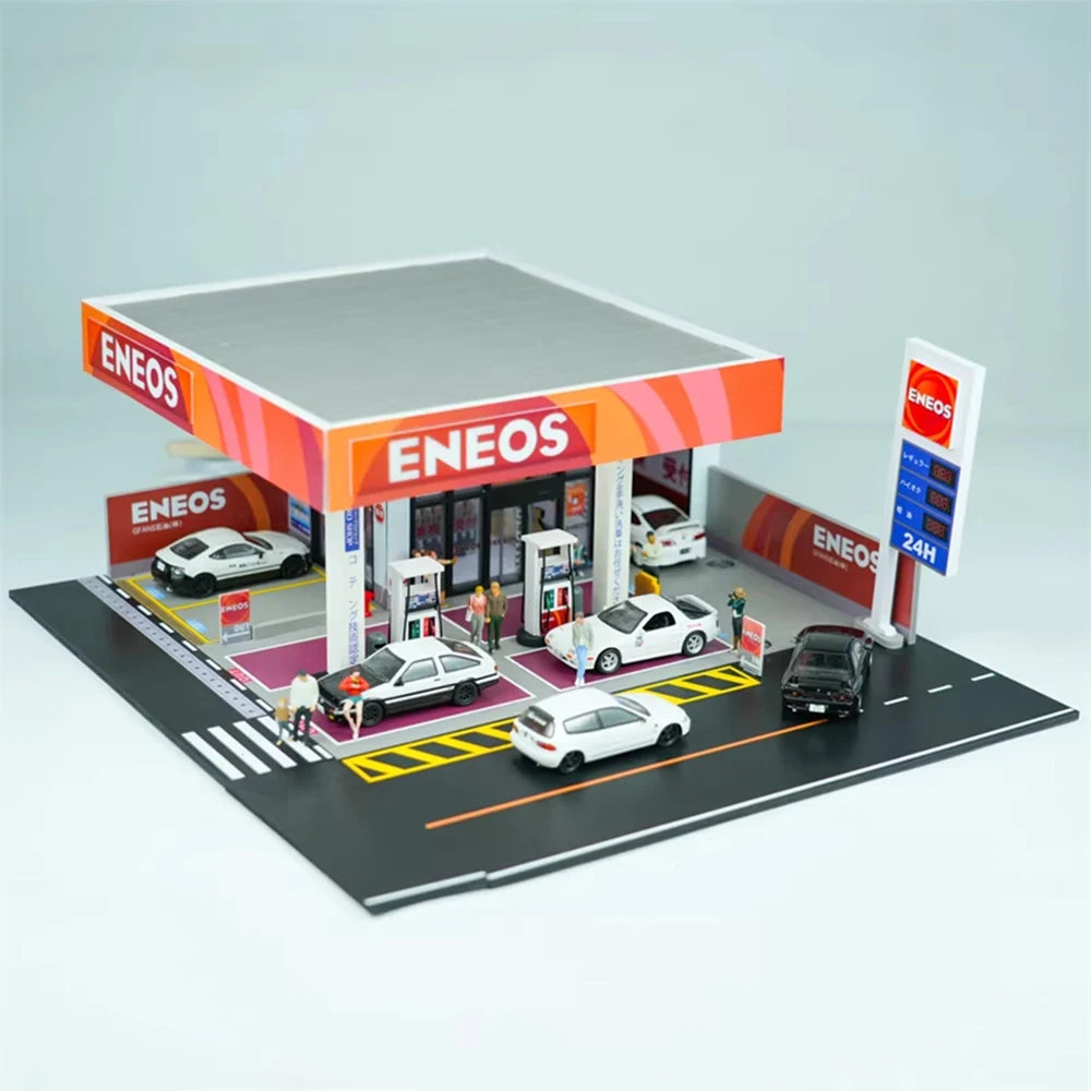 A 1:64 scale LED miniature car garage diorama featuring a storefront and parking lot.