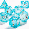 A collection of bright blue liquid core polyhedral dice showing various numbers and a galaxy finish.