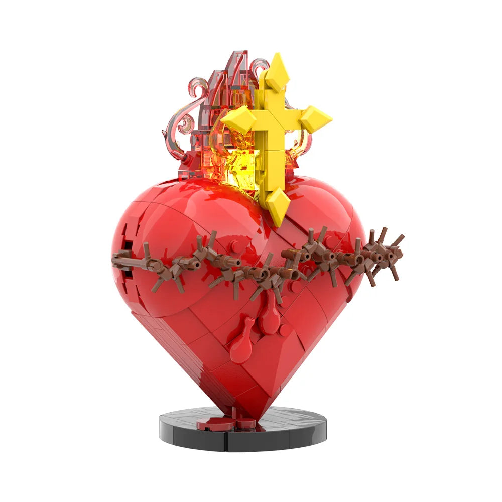 A red heart shaped building block set featuring a golden cross and flames.