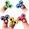 A hand displays four colorful silicone eye rings on fingers, used as sensory fidget toys.