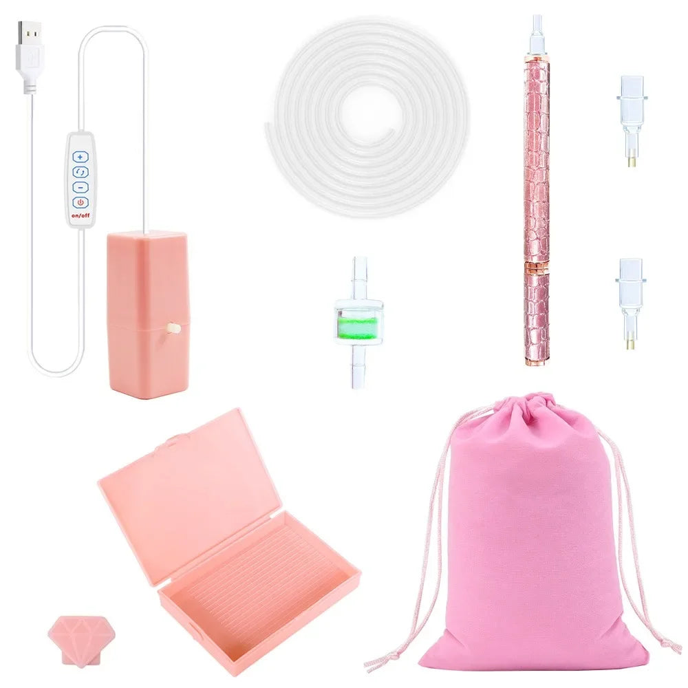 A pink electric diamond painting pen kit with a USB suction tool and storage pouch.