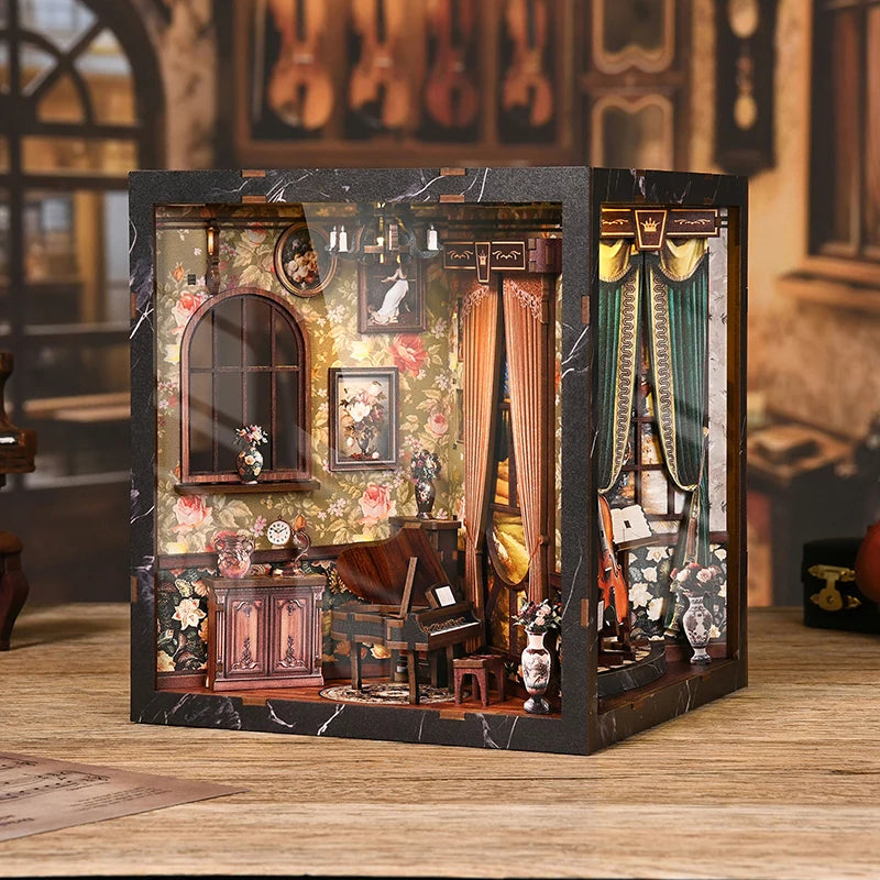 A detailed diorama kit of a vintage music room book nook featuring wooden furniture, plants, and LED lighting.