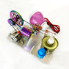 A miniature Stirling engine model featuring a purple-colored light bulb and metallic components.