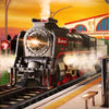 A black vintage steam train locomotive is shown on a track with smoke effects, set against an orange sunset background.