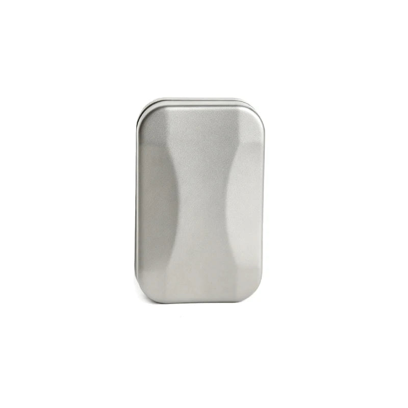 A silver metal fidget slider with a smooth, rounded rectangular shape.