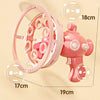A pink electric bubble machine with a rotating mechanism and bubble solution, shown against a light background.