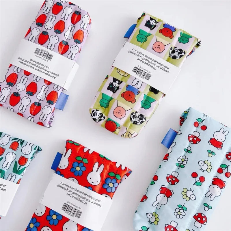 A soft cotton storage bag for Miffy magnetic glasses case in various colorful patterns.