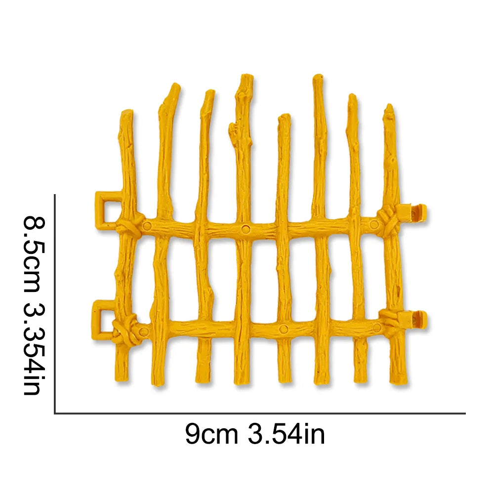 A yellow miniature farm fence set consisting of ten vertical wooden stakes for use in sand tables and dioramas.