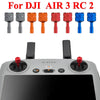 A collection of precision CNC aluminum joystick thumb sticks in various colors for the DJI AIR 3 RC 2 drone.