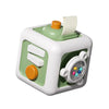 A white and green cube activity set with a lid, featuring buttons and a clear viewing window for toddlers.