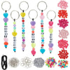 A collection of various beaded keychains and loose beads in different colors and styles.