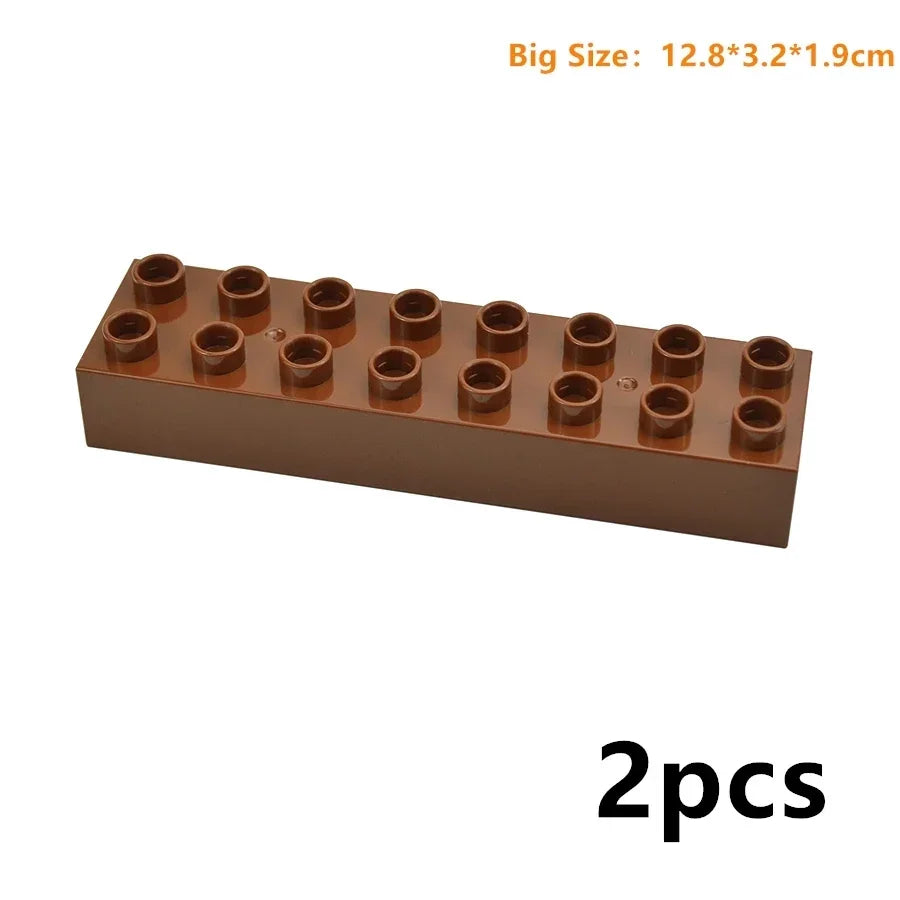 Un plateau rectangulaire de gros blocs de construction marron, montrant 2 pièces.