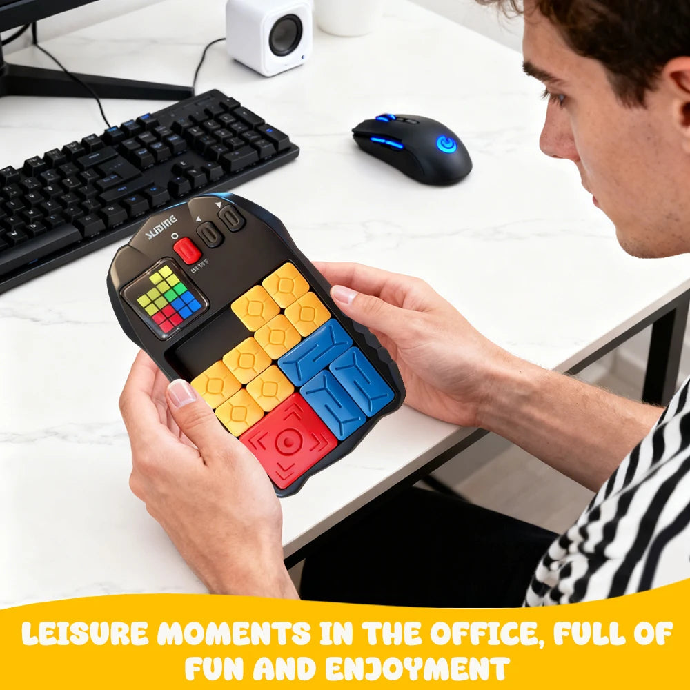 A person is holding an electronic sliding block puzzle with colored blocks and an LED screen on a white desk.