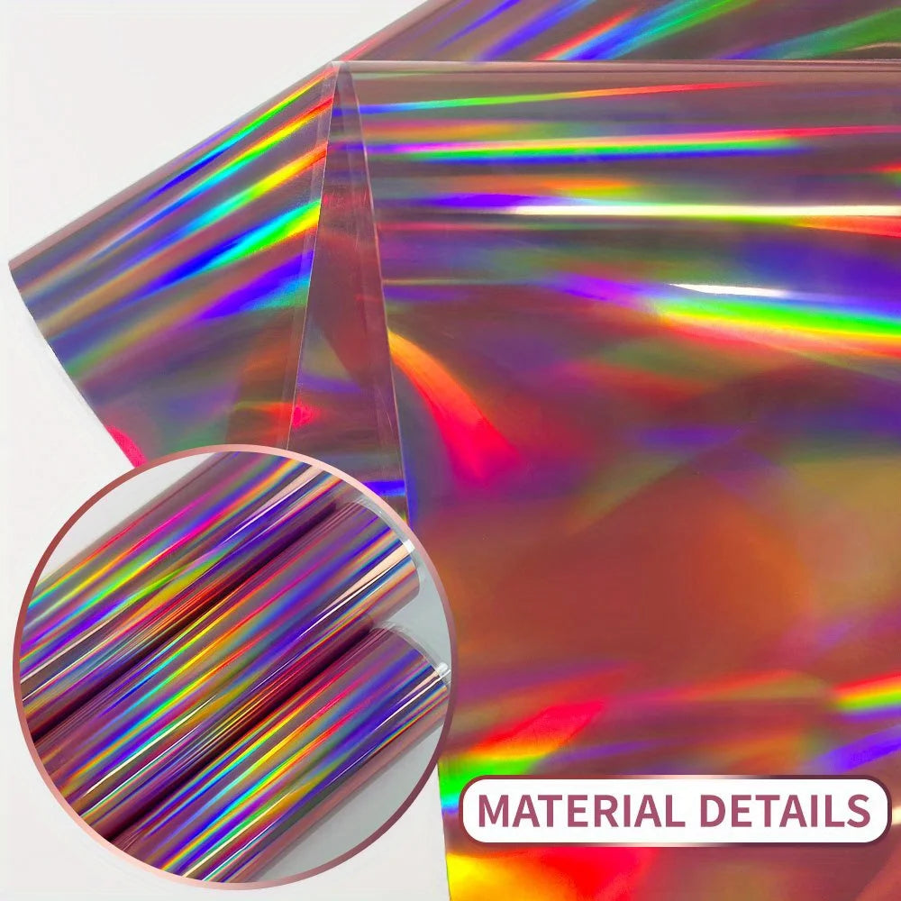A close-up view of a holographic vinyl roll showing iridescent rainbow colors and light reflections.