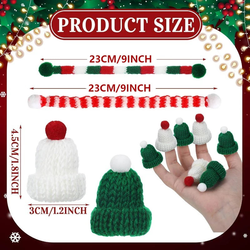 A set of knitted accessories for dolls including a long scarf and a small knitted hat in white and green.