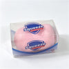 A clear plastic container holding a pink squishy fidget block for stress relief and sensory play.