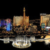 A scratch art depiction of a city night scene featuring the Eiffel Tower and Las Vegas skyline reflected in water.