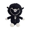A black plush toy resembling a skull with white accents and features.