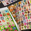 A colorful sheet of cute cartoon stickers featuring various animals and objects for journaling and crafting.