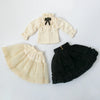 Vintage lace maid dress set for dolls featuring a cream blouse and black skirt