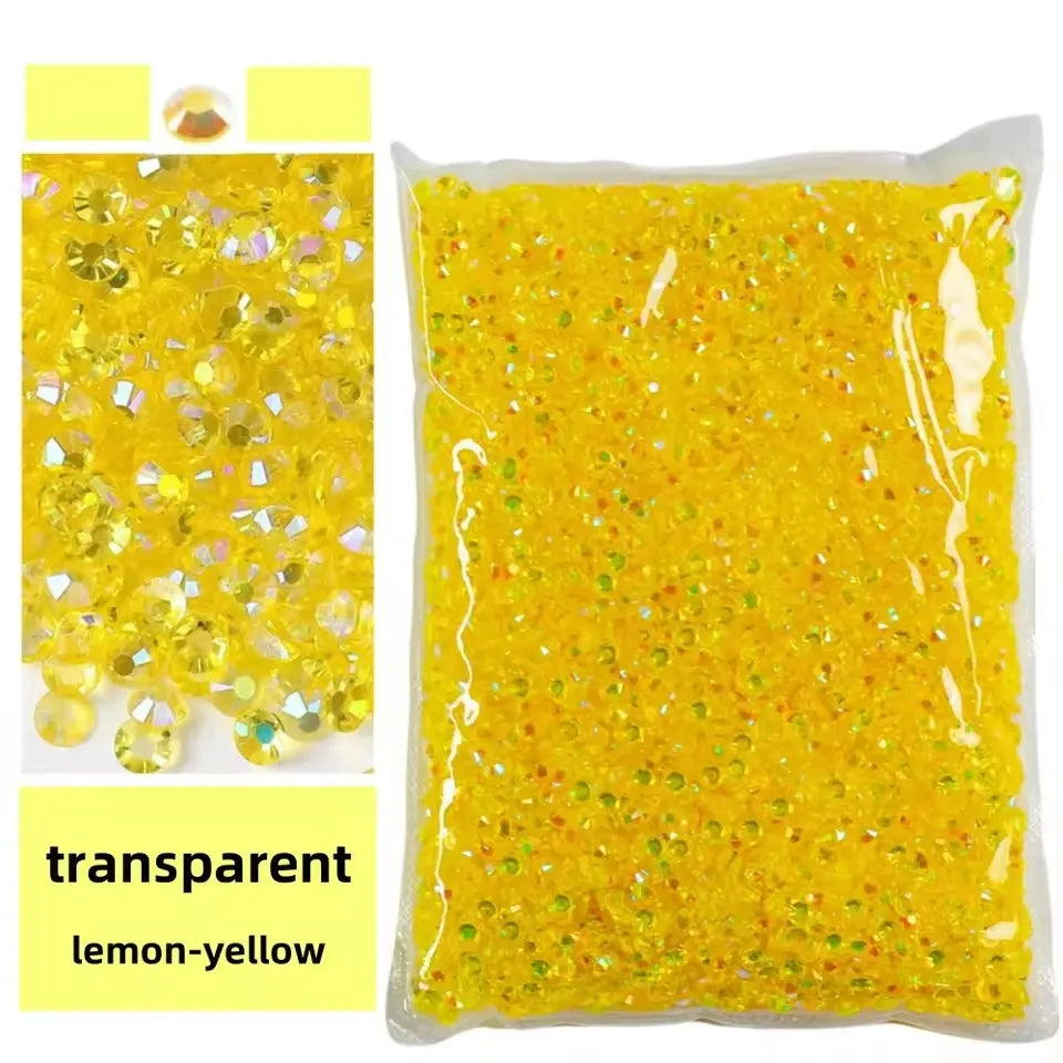 Bag of transparent lemon-yellow resin rhinestones for crafts and DIY projects