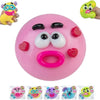 A pink moldable dog face squishy sensory toy with features like eyes and a nose.