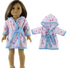 A doll wearing a pink and blue polka dot hooded outfit set.