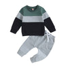 Toddler boys color block sweatshirt and pants set in shades of gray, black, and sage green