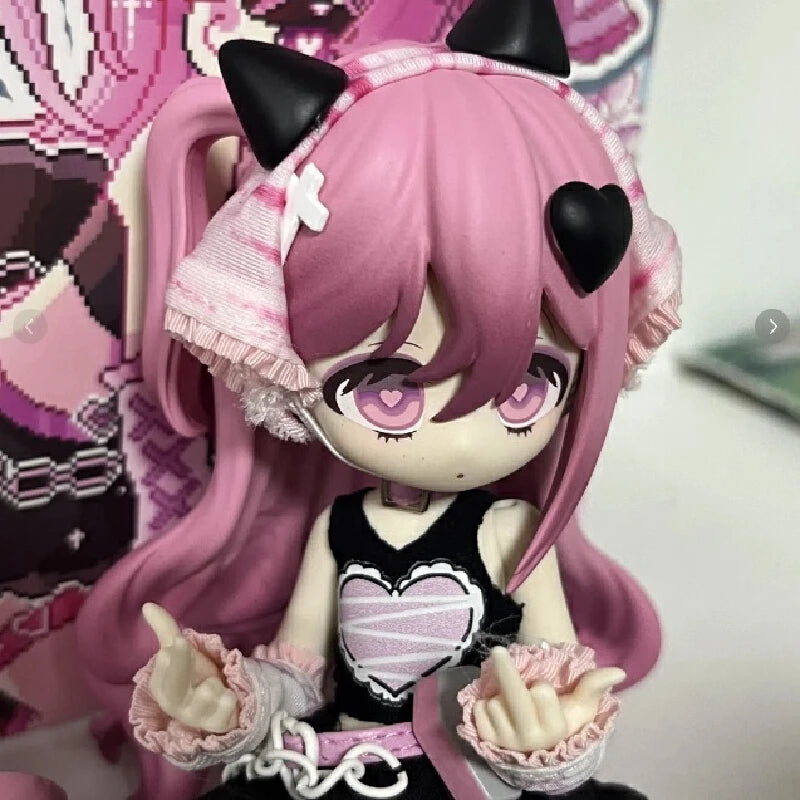 A pink-haired anime figure with black cat ears and heart accents is displayed in a mystery box context.