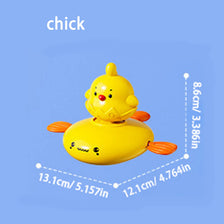 A yellow chick bath toy with orange feet and a round body.
