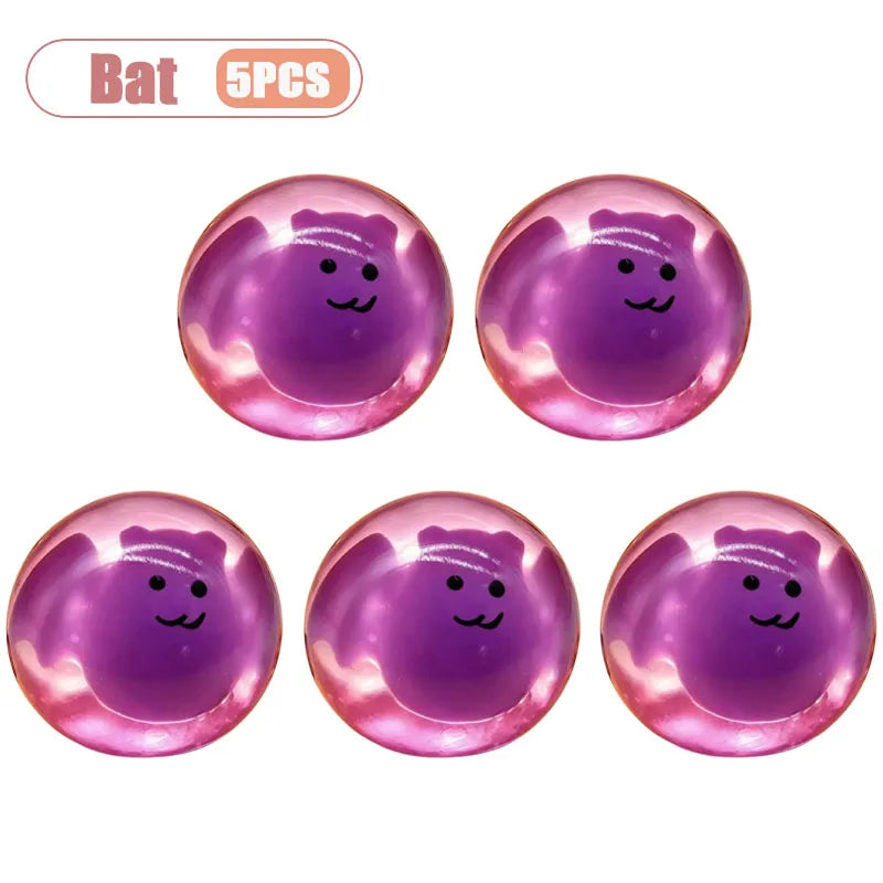 Five purple pumpkin head squishy stress relief toys