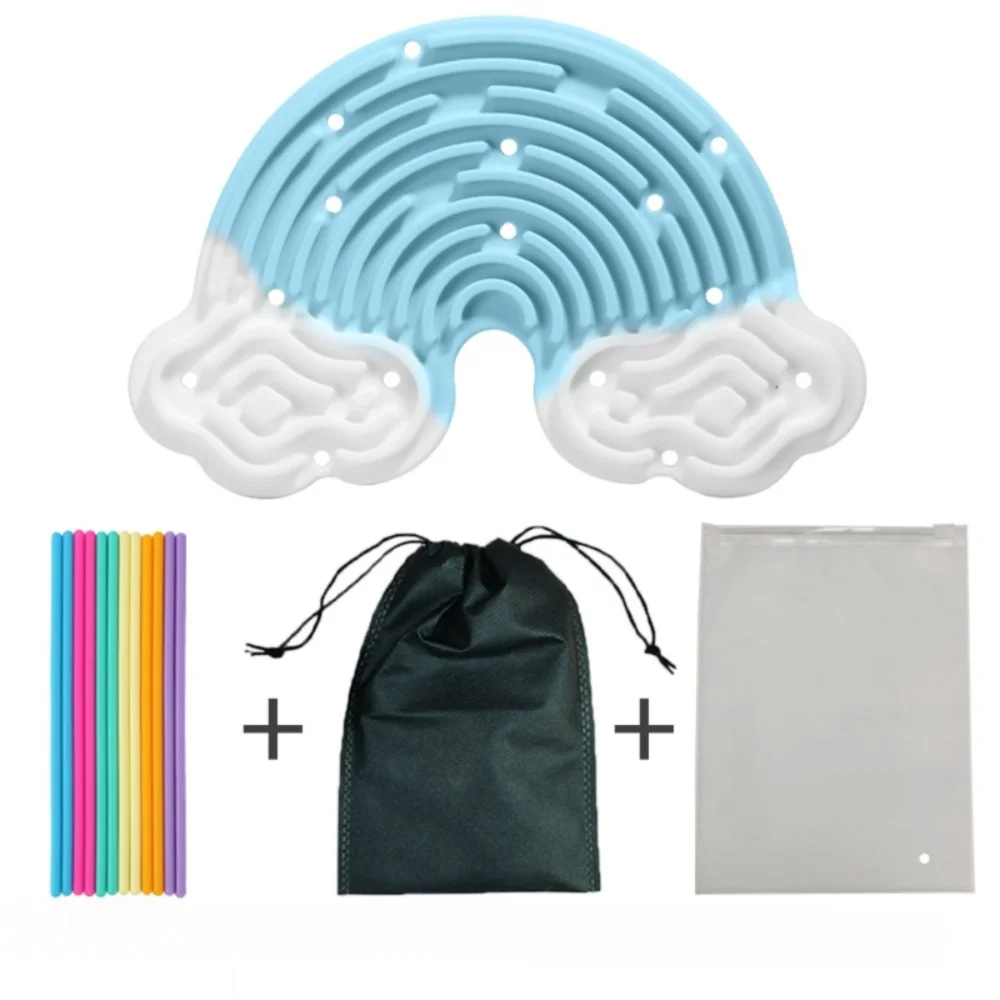 A light blue silicone sensory activity board shaped like a brain, accompanied by colored strings and a clear plastic bag.