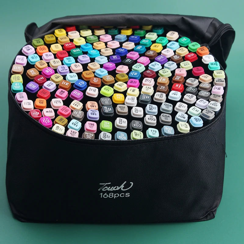 A black pouch filled with numerous alcohol art markers in various colors and tips.