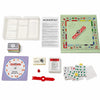 A collection of Monopoly board games including a classic board, game cards, and tokens.