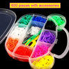 A collection of 600 pieces of colorful plastic loom bands and accessories for DIY bracelet making.