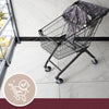 A black wire shopping cart with a protective seat cover is shown on a tiled floor.